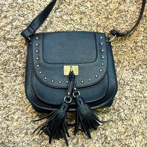 Black cross body bag with gold accessories & beautiful black tassels. New.